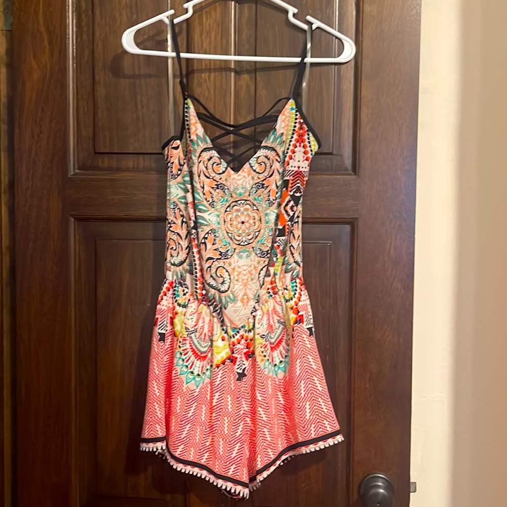 Festive romper with cross detail - size S